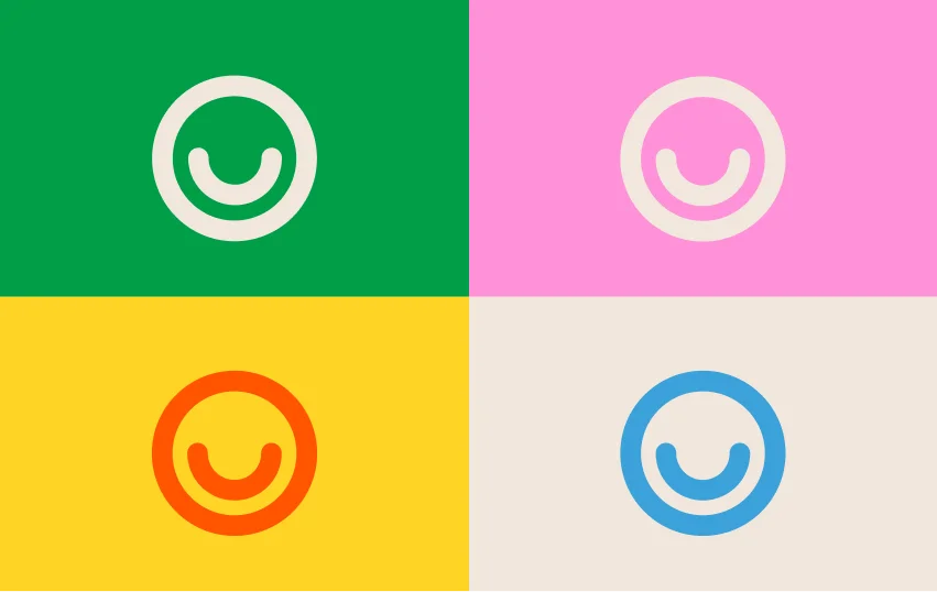 The Bucketlist smiley-face logo in four colour combinations